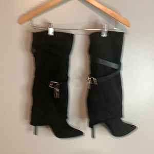 Yoky NWOT women’s black suede high heels boots size 7 in excellent condition.